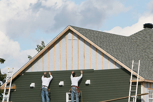 Professional Siding Installation technician working in Syosset, NY